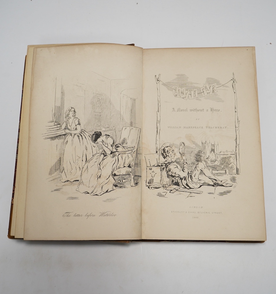 Thackeray, William Makepeace - Vanity Fair. A Novel Without a Hero. First Edition (bound as 2 vols.) engraved pictorial (vol.1) and printed (vol.2) titles, 39 plates and num. text engravings; contemp. gilt ruled half cal